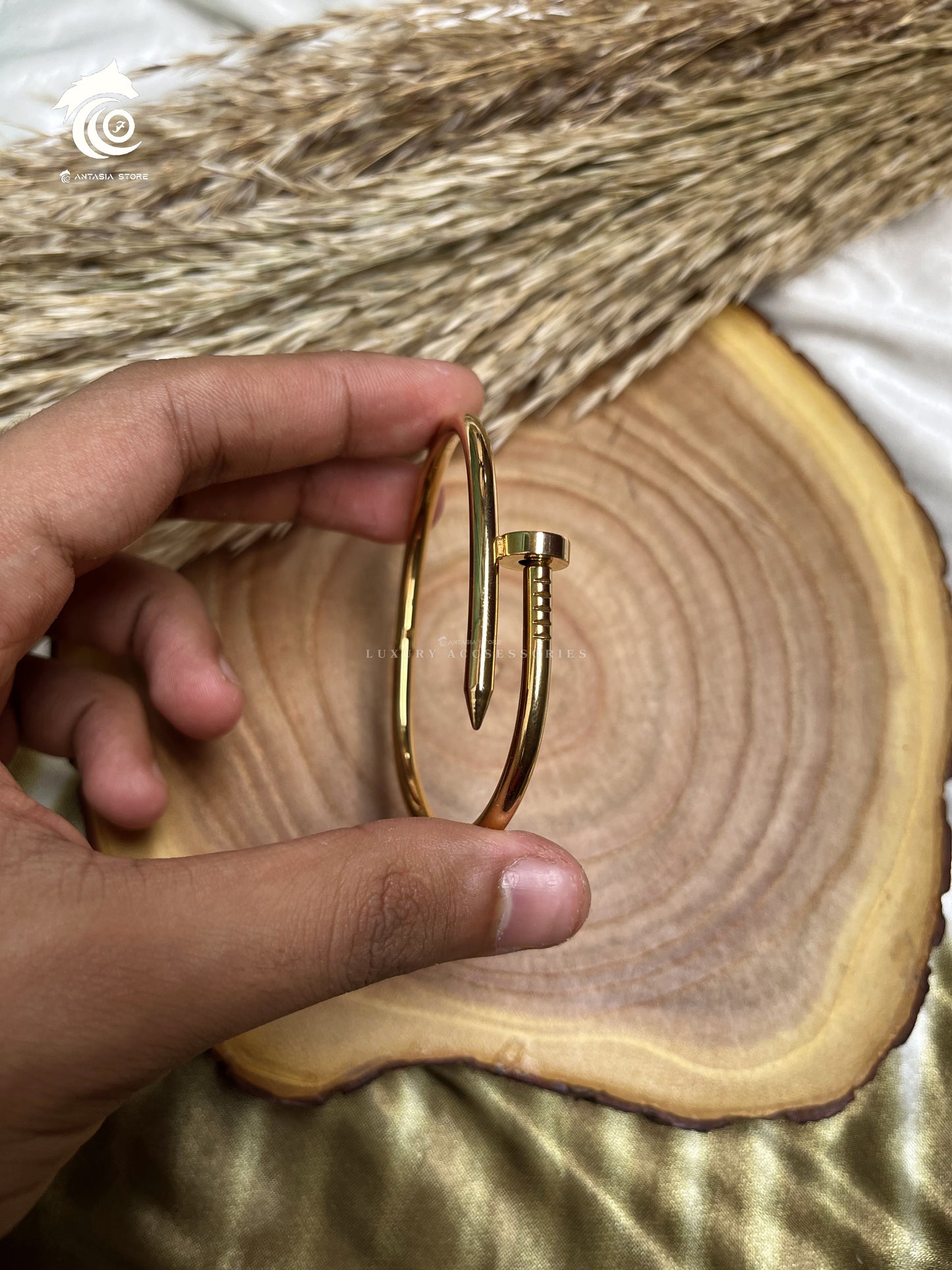 gold nail bracelet